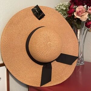 Wide tan beach hat